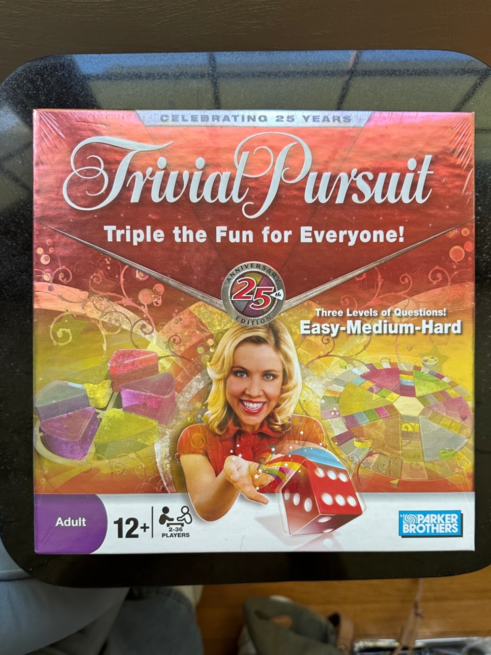 Trivial Pursuit Board Game - Red/Yellow Edition by Parker Brothers